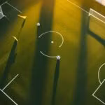 Sân bóng nhìn từ trên cao lúc hoàng hôn với hai khung thành, minh họa link xoilac live xem ASEAN Cup 2026